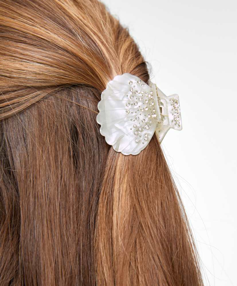 Presilha de cabelo em formato de concha brilhante