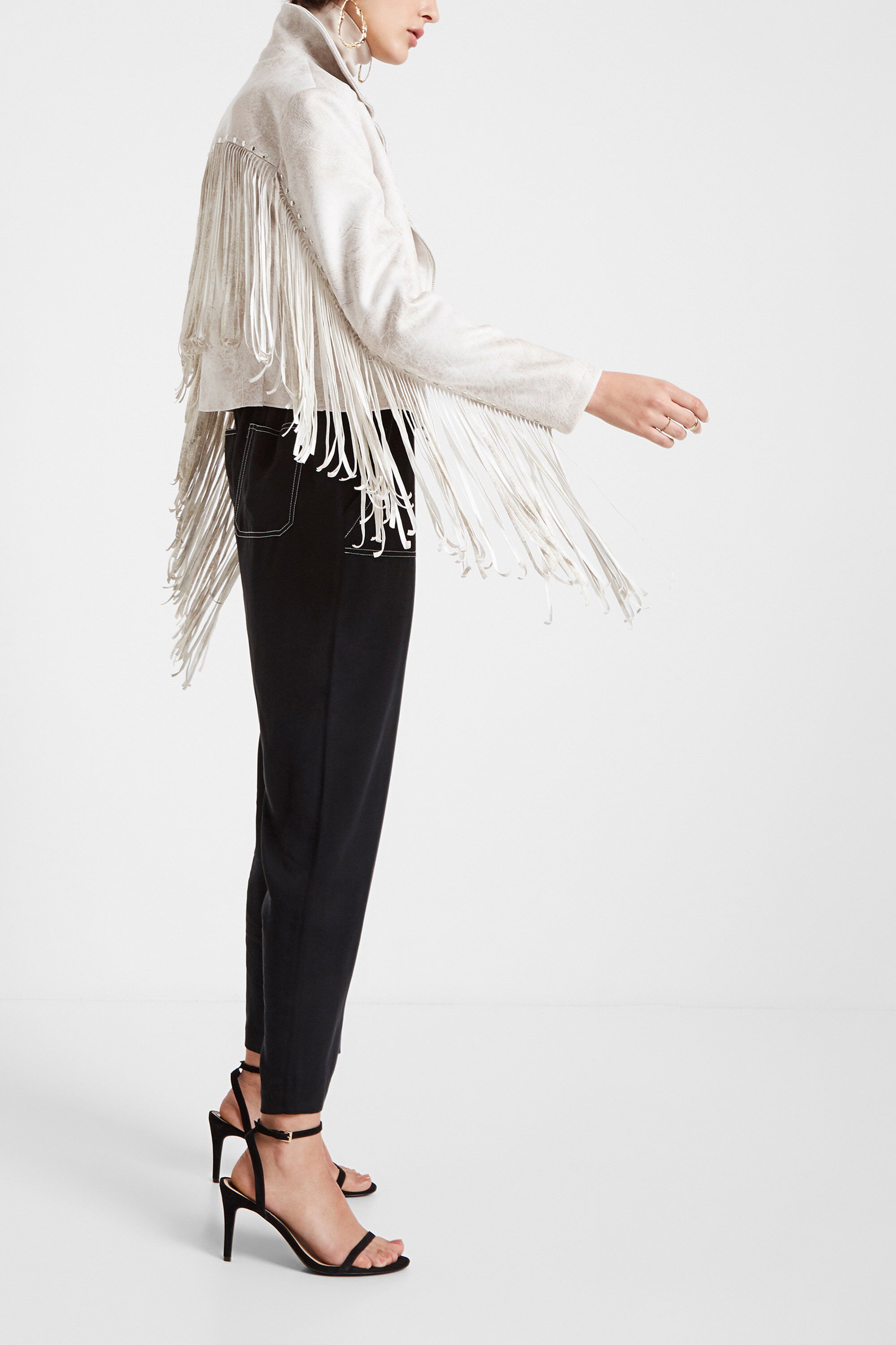 Veste motarde à franges et clous