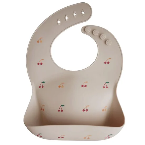 Bavoir en silicone   Cherries        de               mushie