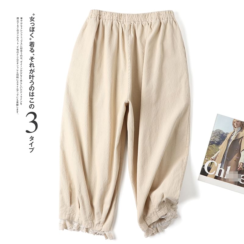 CosmoCorner - Corduroy cropped harembroek met elastische taille en bloemenaccent