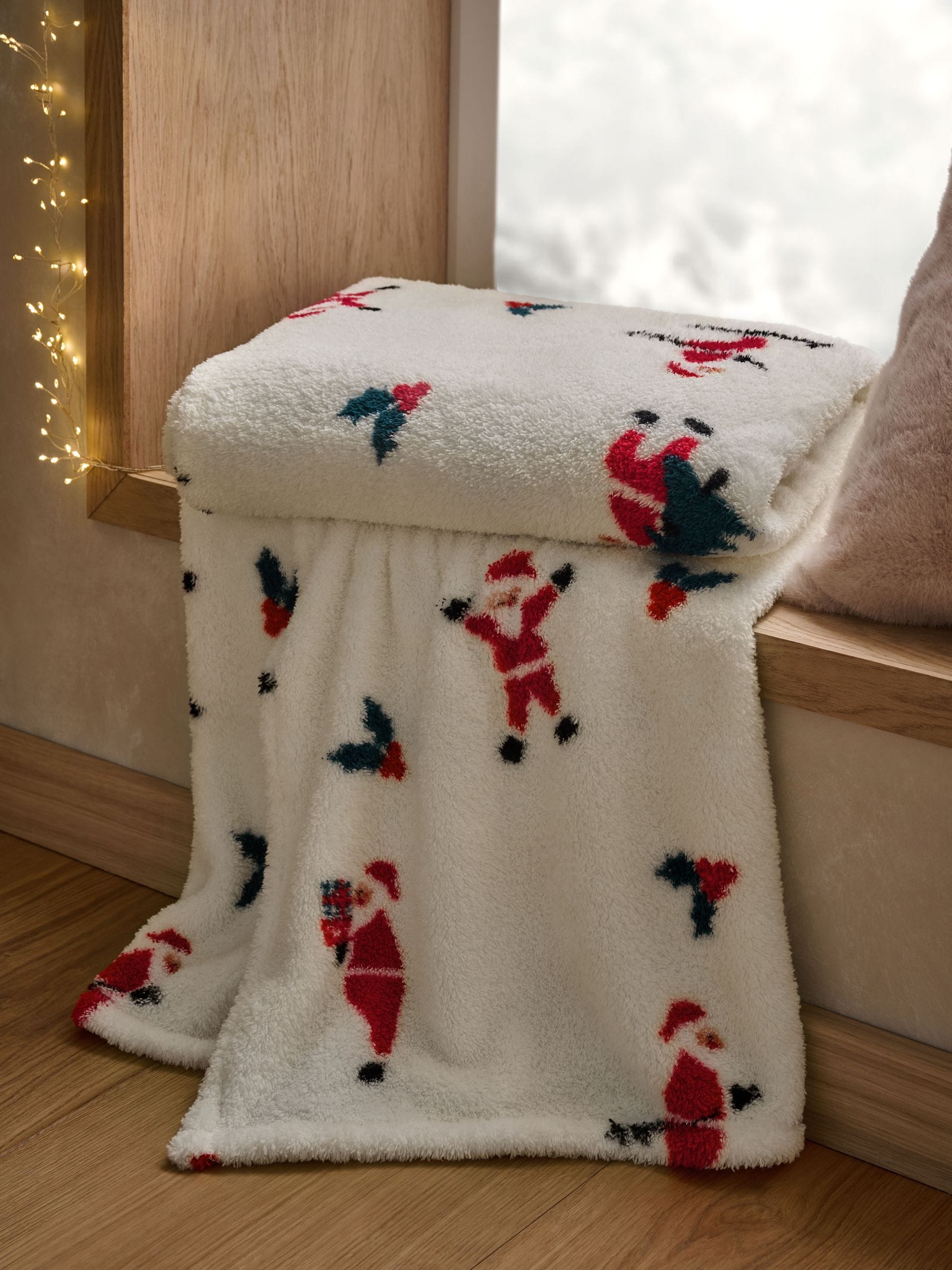 Fleece bedloper met kerstmannenprint