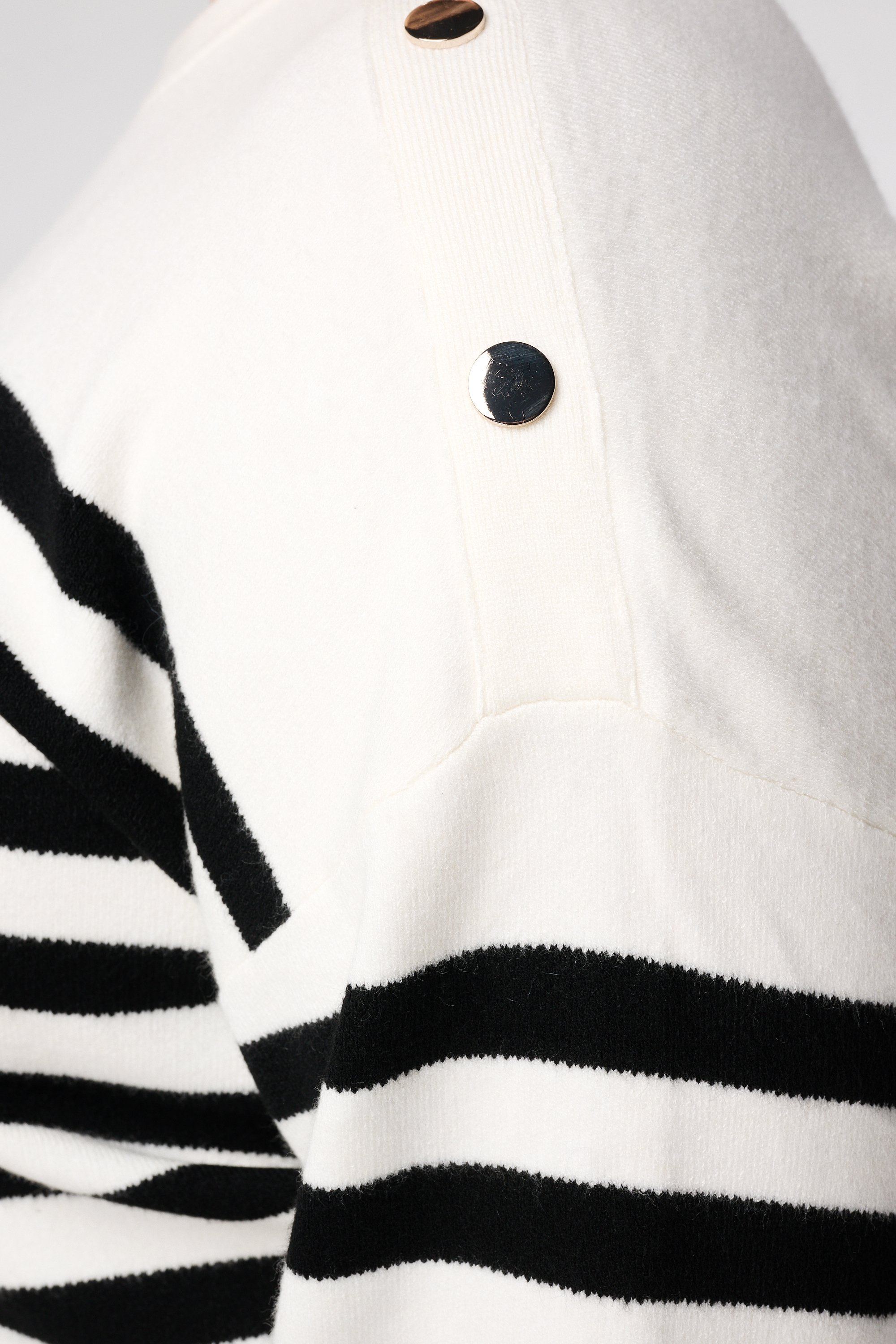 Gestreepte trui met knoopdetail Multi zwart-wit