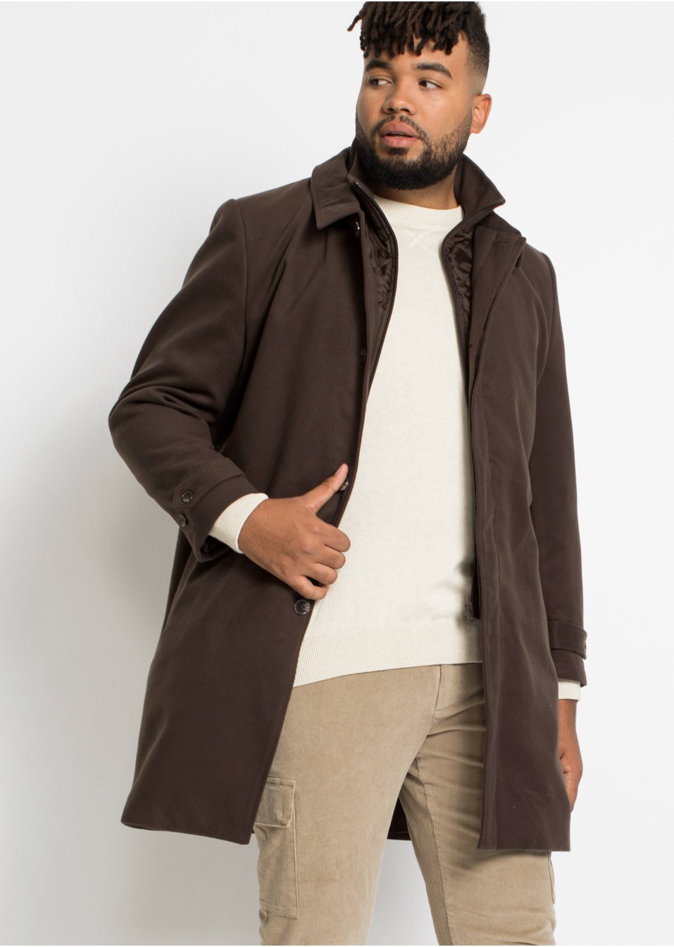 Manteau court avec empiècement coupe-vent