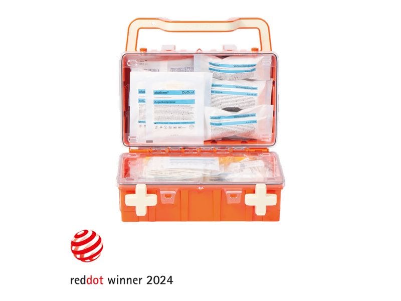 SÖHNGEN Erste-Hilfe-Set DYNAMIC-GLOW, DIN 13157, Orange, S Erste-Hilfe-Koffer inklusive Wandhalterung