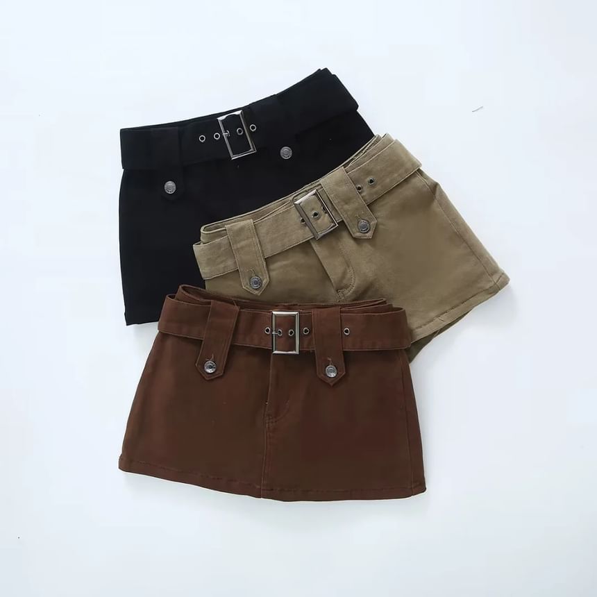 Reknovine - Mini denim rok met lage taille en riemaccent