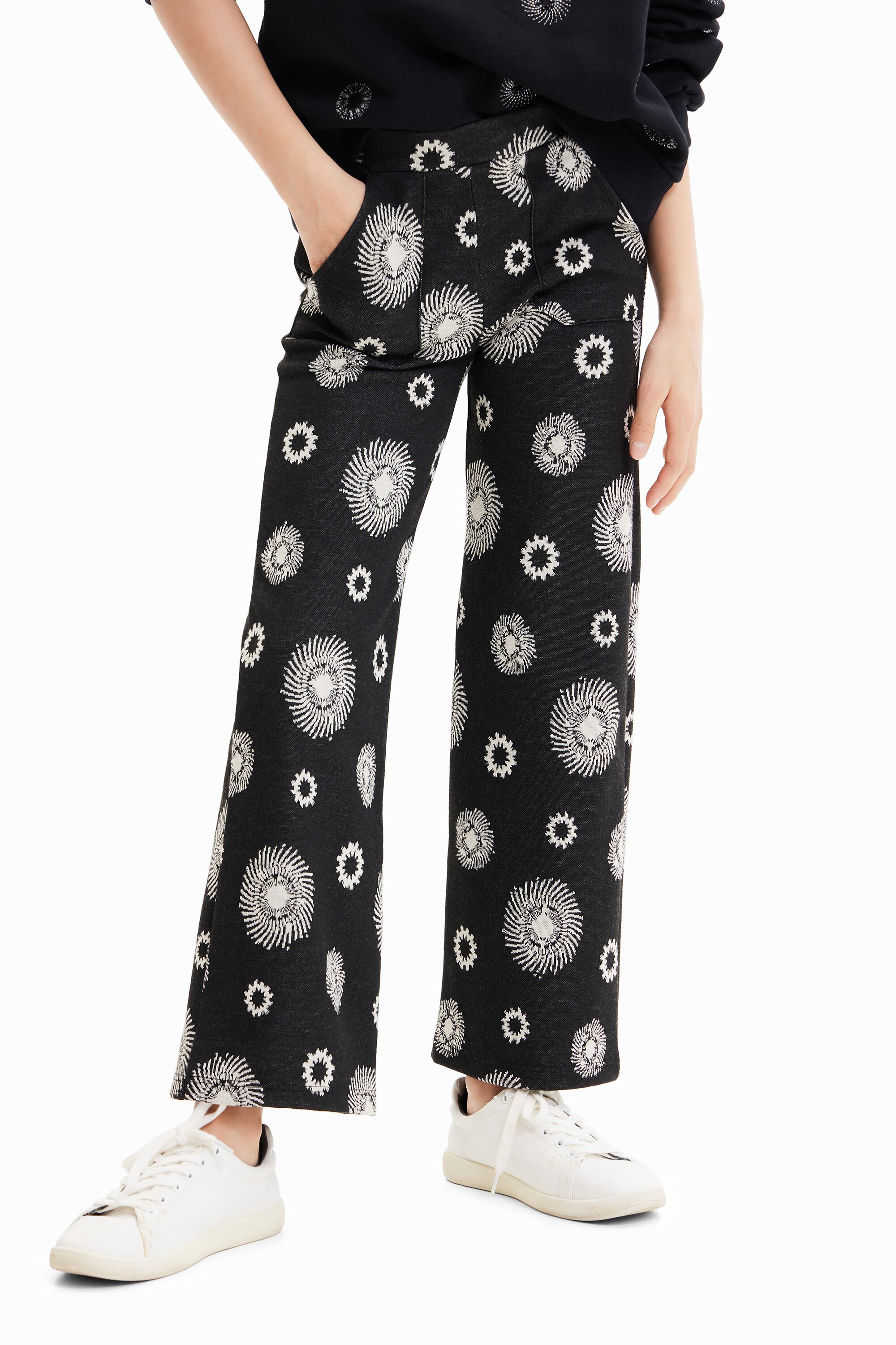 Calça flare geométrica
