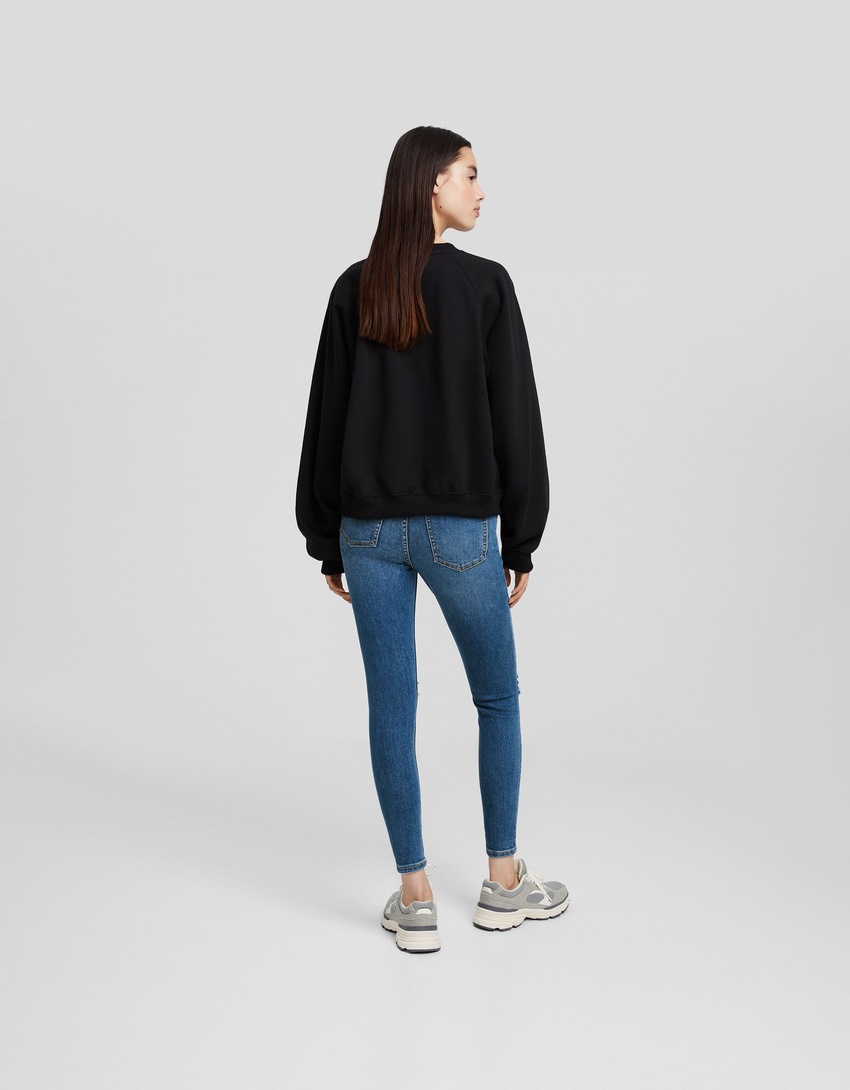 calça jeans skinny vintage de cintura baixa
