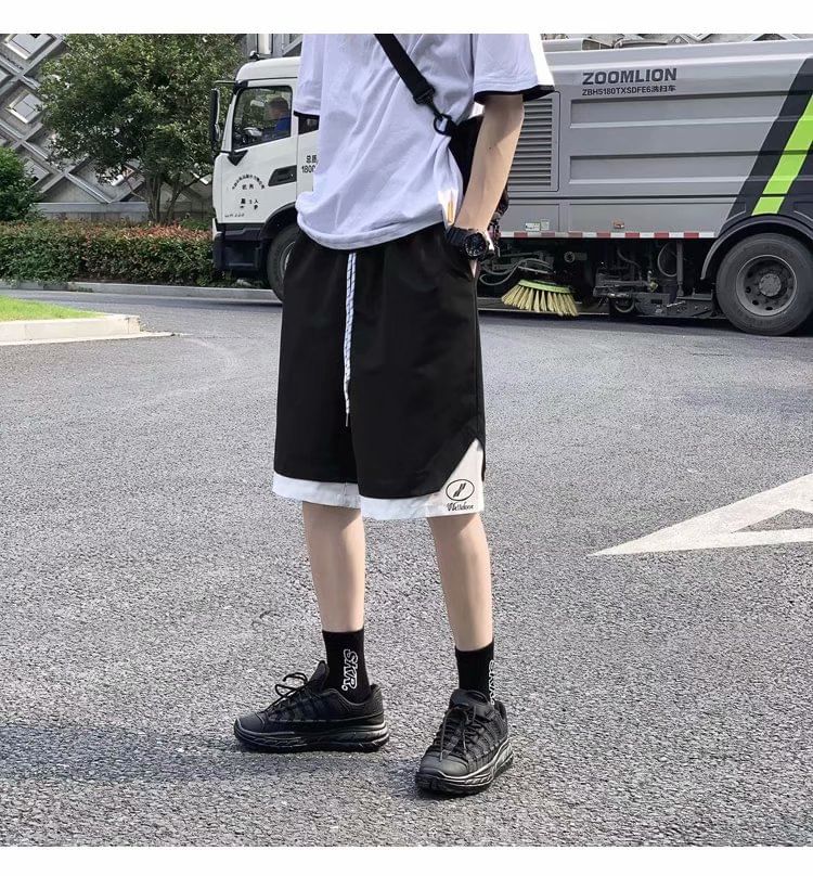 Macho - Tweekleurige shorts met wijde pijpen en trekkoord in de taille