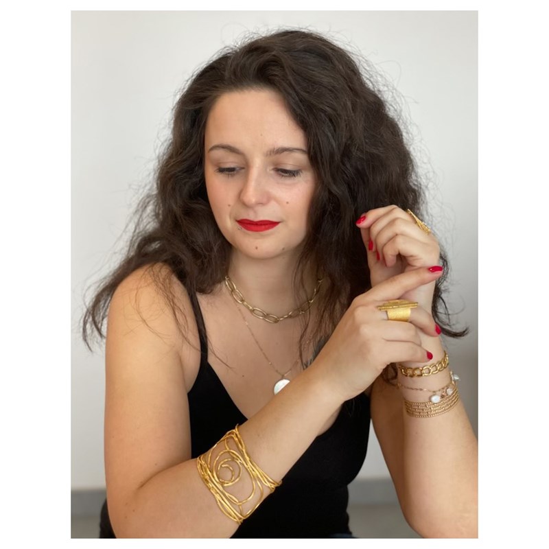 Bracelet rigide en acier doré ajustable