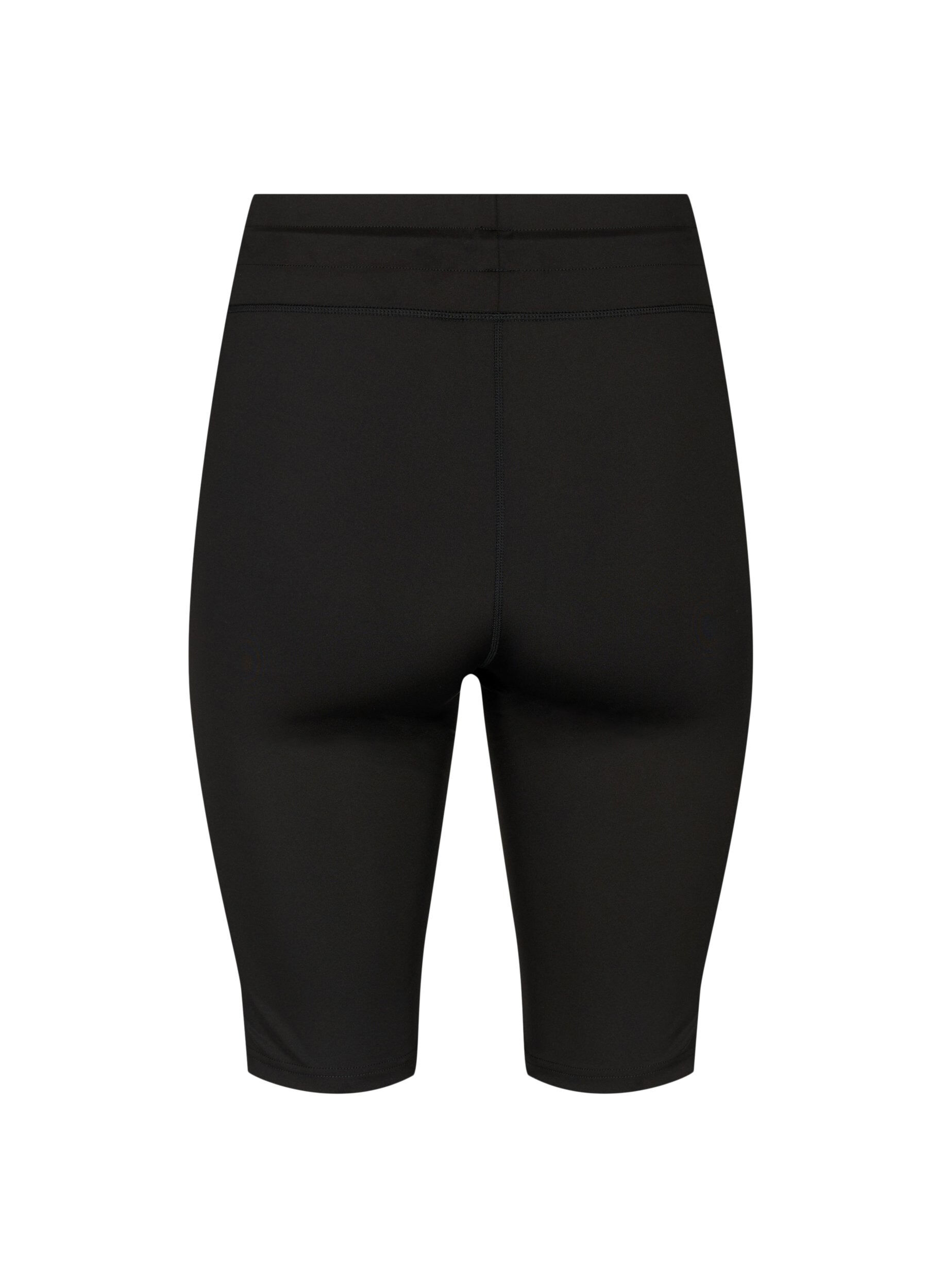 Tætsiddende træningsshorts med lommer