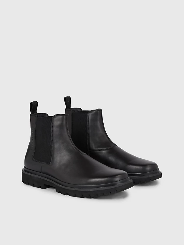 botas de couro até o tornozelo