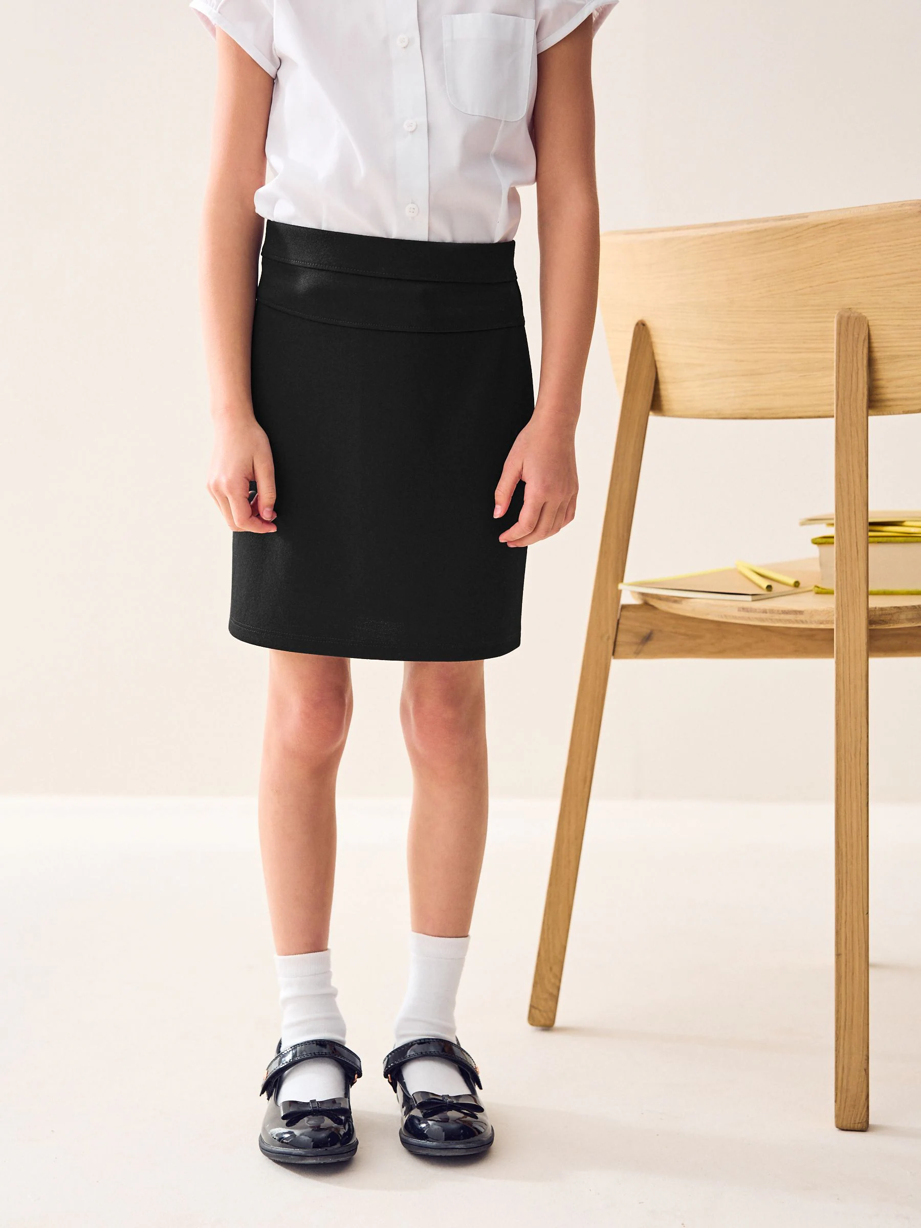 Zwart - Jersey stretch schoolkokerrok met aantrekkoord (3 - 18 jr)