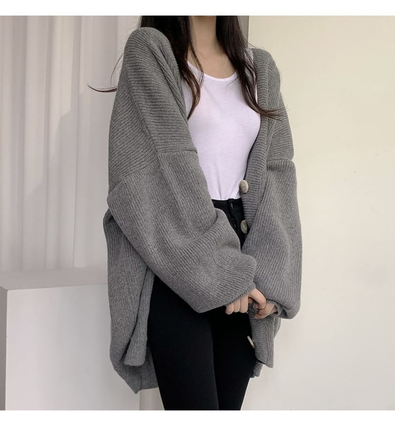 Frigga - V-hals effen oversized vest met knoopjes