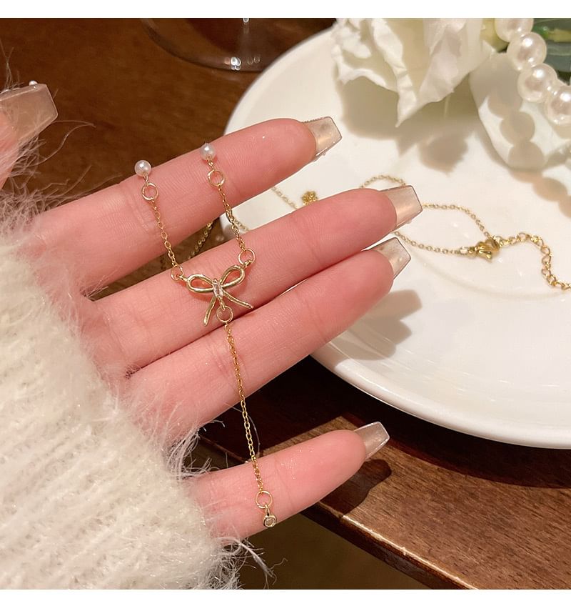 LIVSIA - Ketting met strik en nepparels