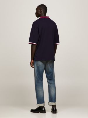 Polo de modelagem relaxada com gola contrastante