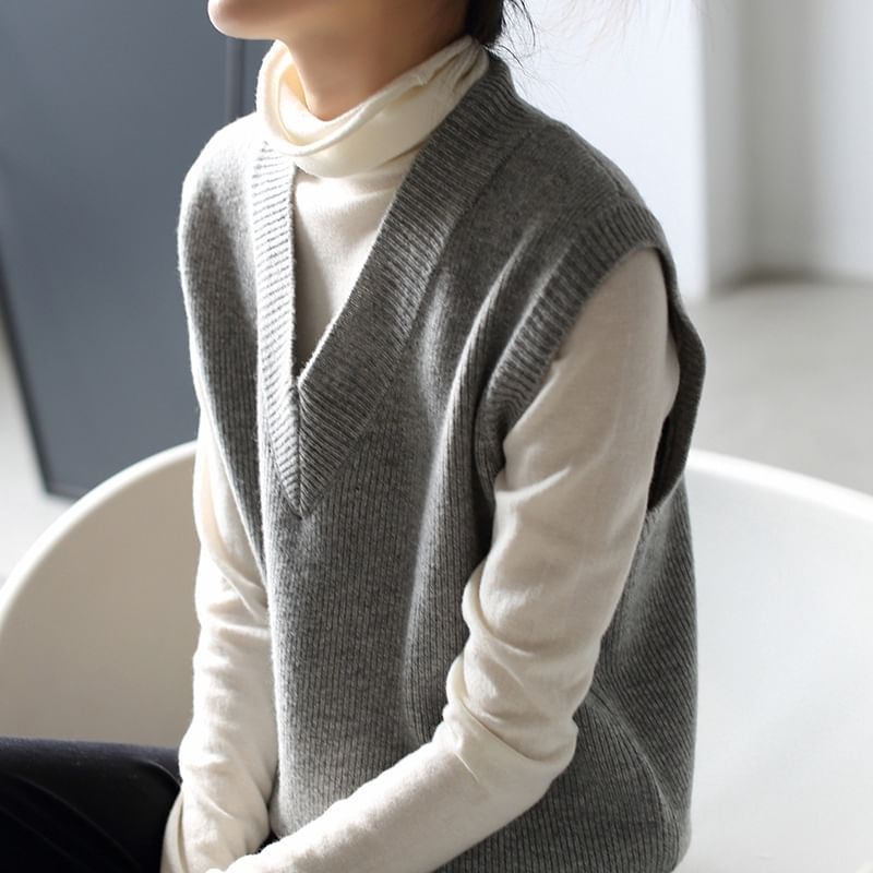 Omibayo - V-hals effen geribbeld vest