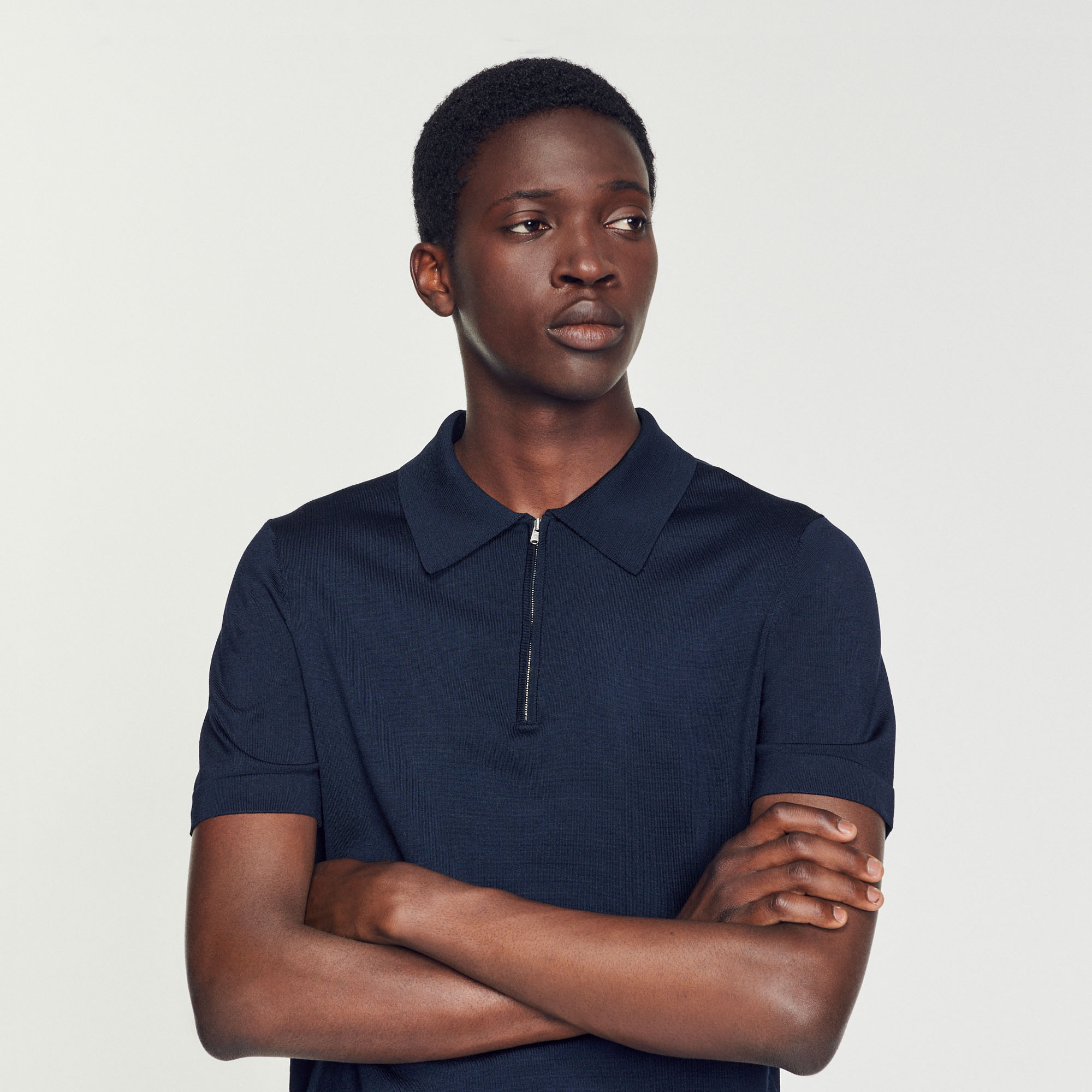 Polo en maille á col zippe