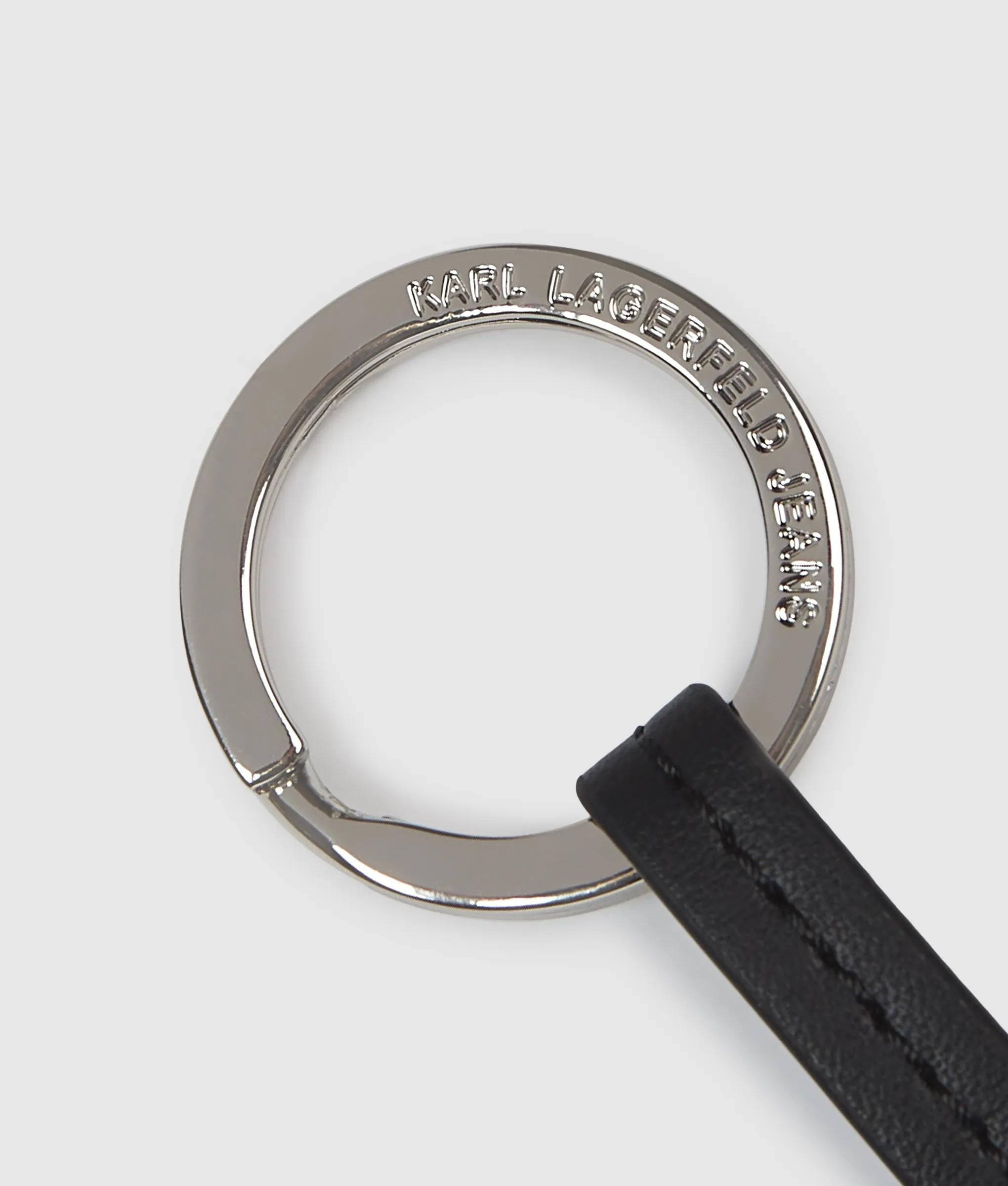 Sleutelhanger in de vorm van een spijkerjas