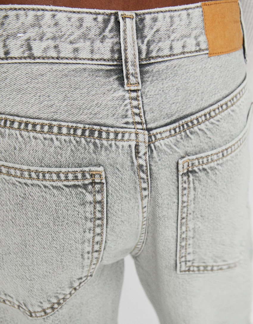 calça jeans de perna larga