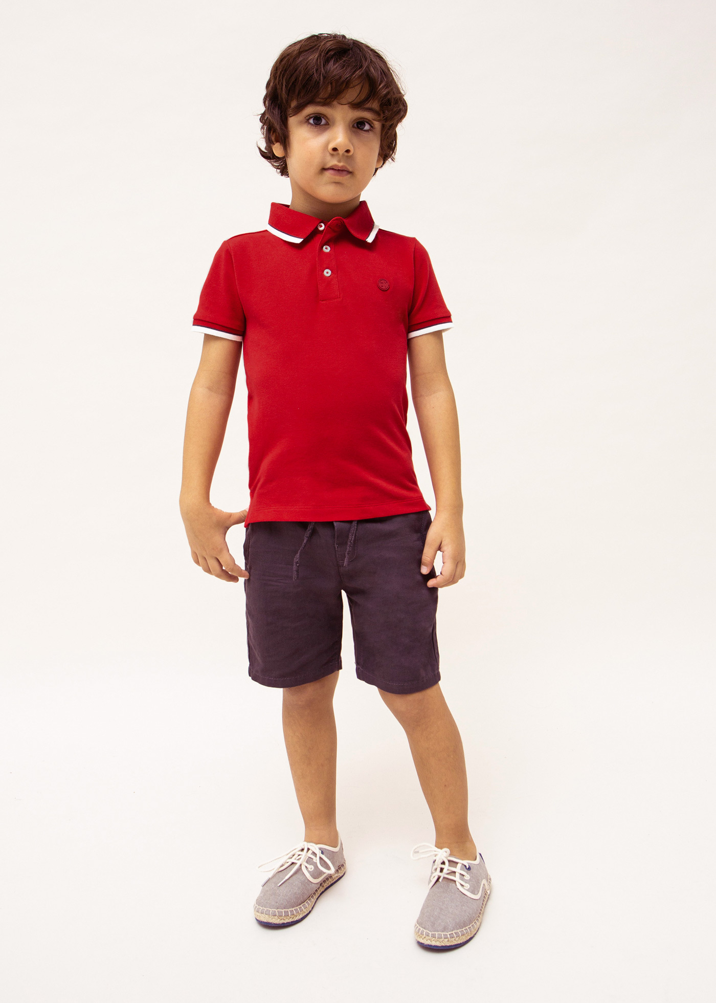 Camisa polo de manga curta em algodão sustentável para meninos