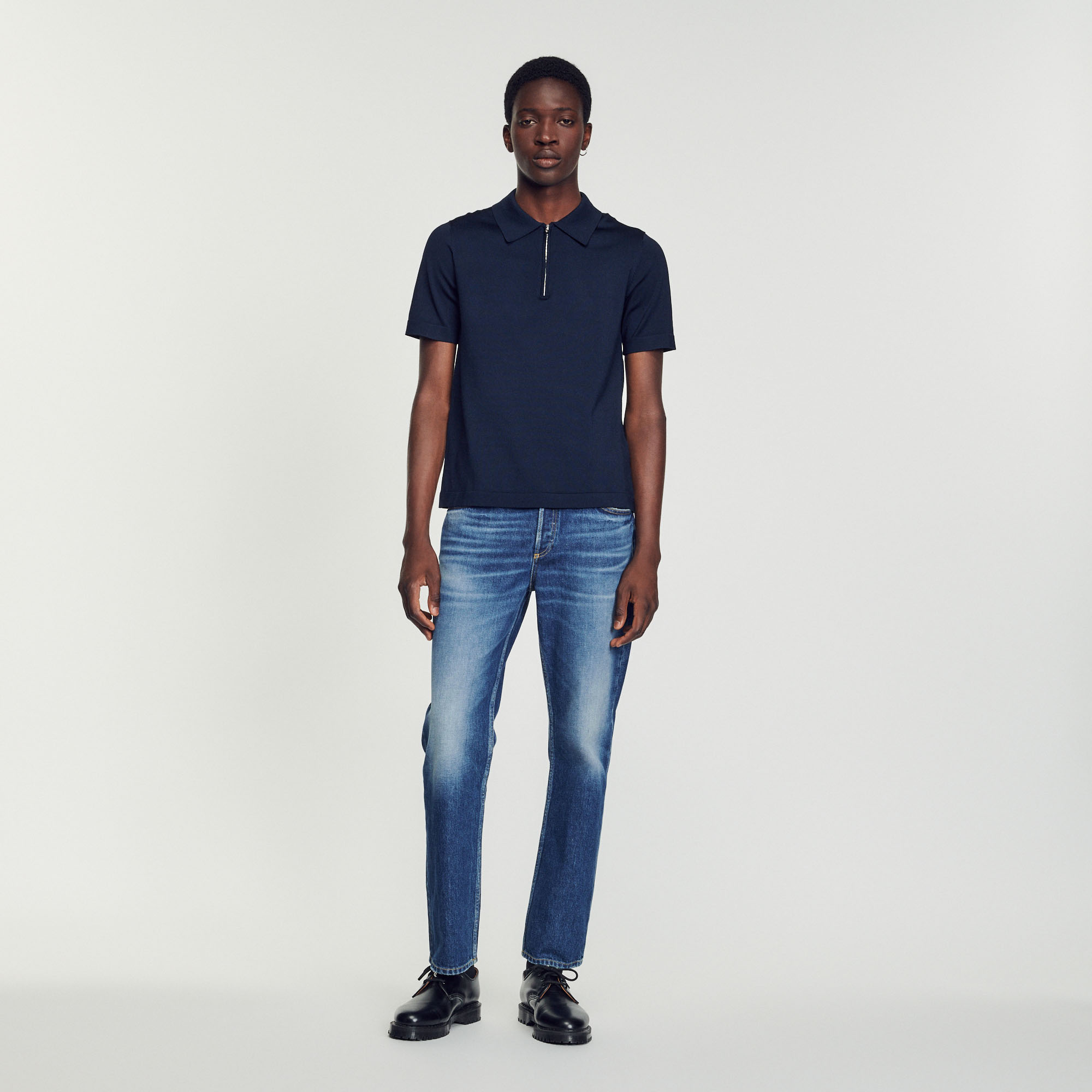 Polo en maille á col zippe
