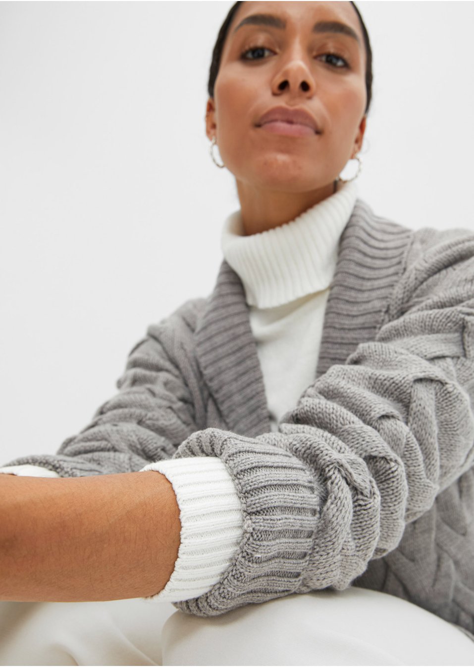 Gilet en maille à col châle et motif torsadé