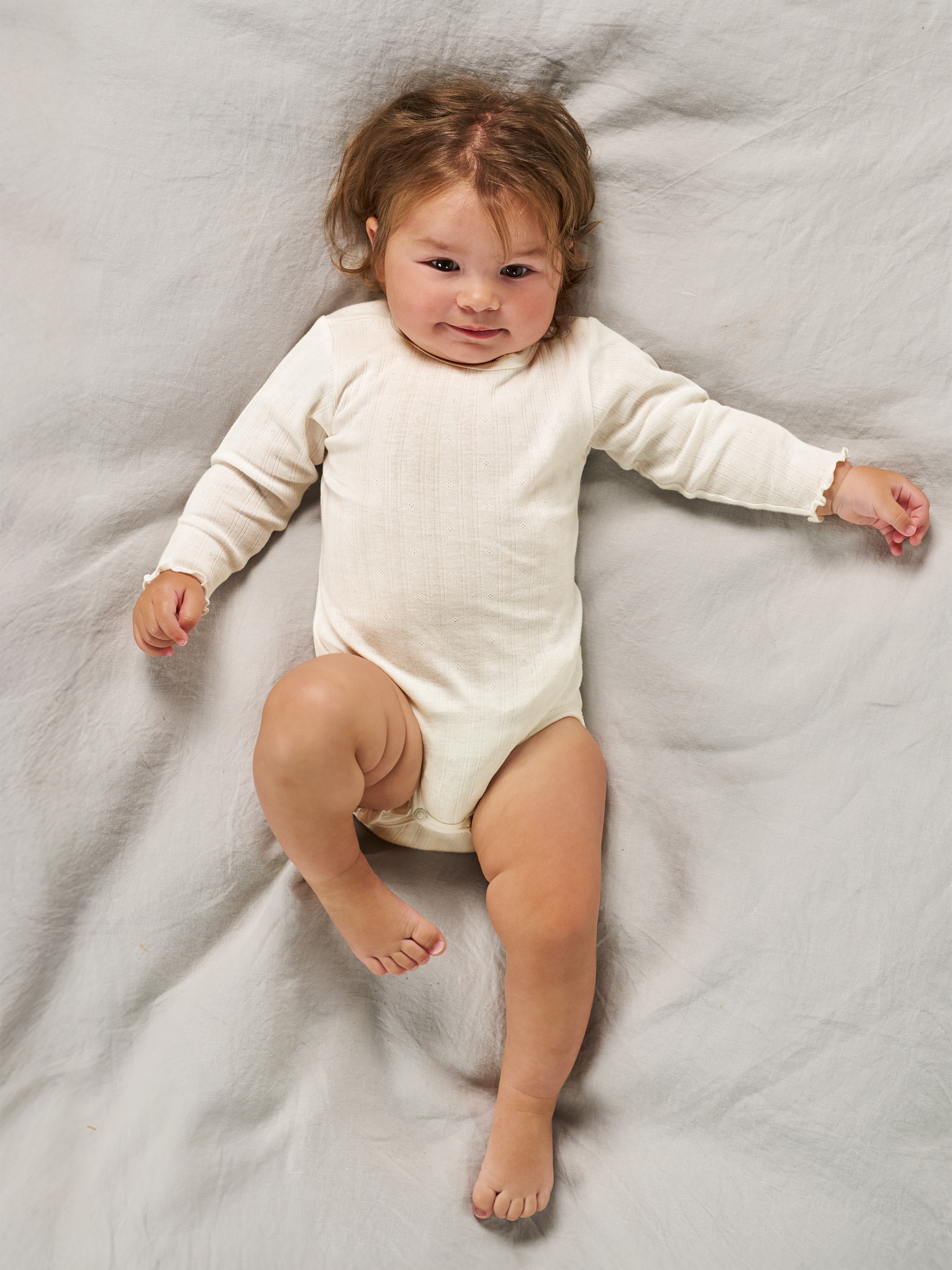 Pointelle romper lange mouw van katoen voor baby’s