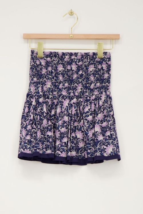 Blauw rokje met paarse bloemenprint