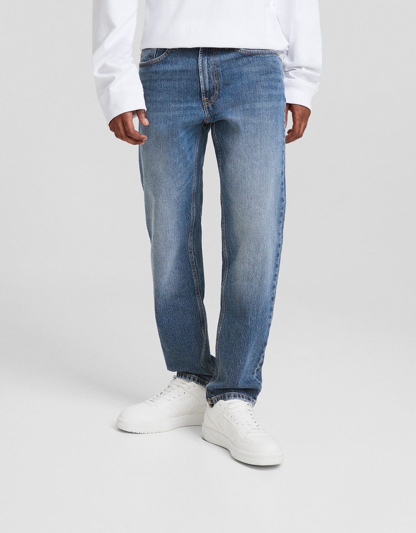 calça jeans de corte justo