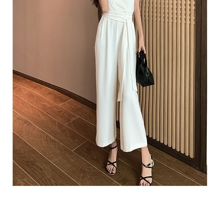 Morning Glory - Mouwloze jumpsuit met wijde pijpen