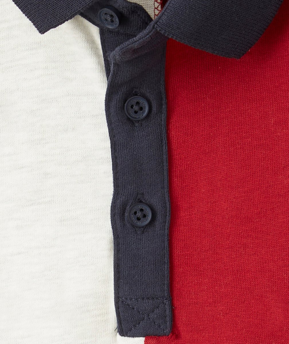 POLO GARÇON EN COTON BIOLOGIQUE COLORBLOCK AVEC MESSAGE