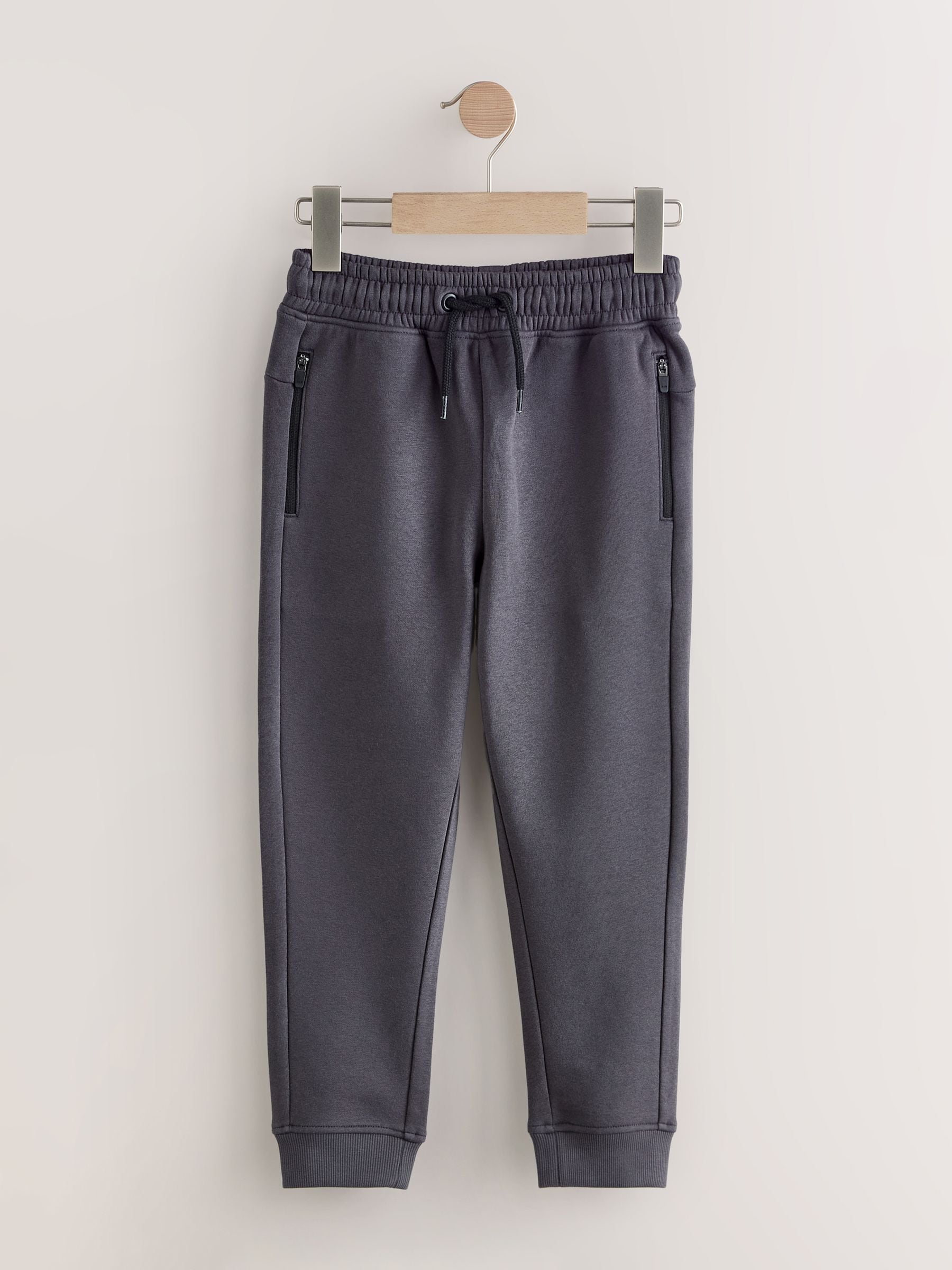 Steen/grijs - Slim-fit joggingbroek met ritszak (3-16jr)