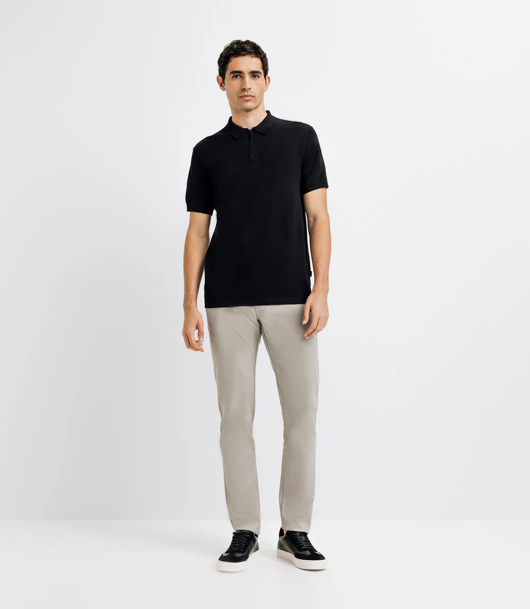 Polo avec col zippé noir