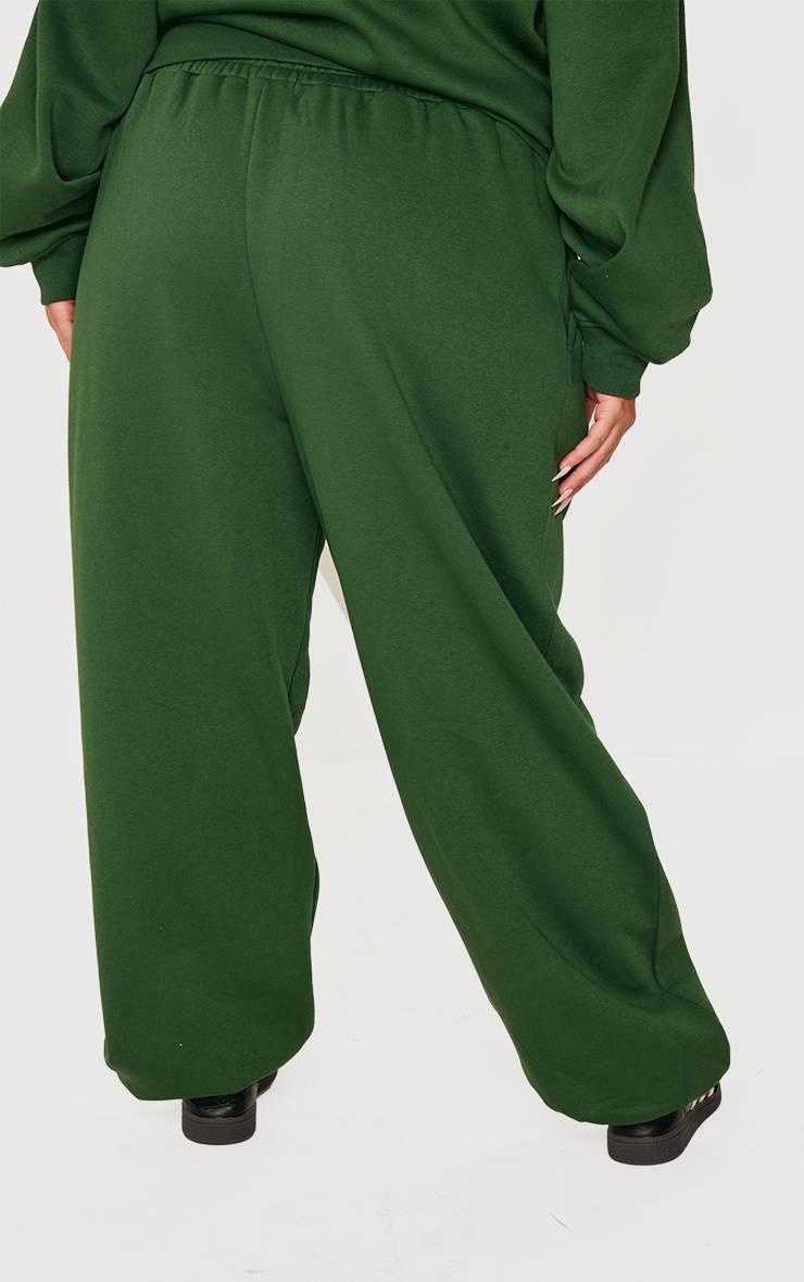 Forest Green Prettylittlething Plus Jogging À Revers Avec Appliqués Imitation Peau De Mouton