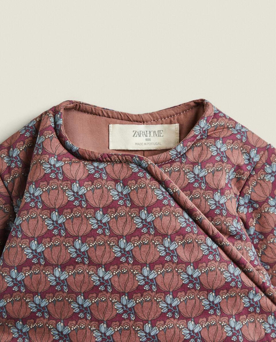 Body infantil confeccionado em tecido Liberty