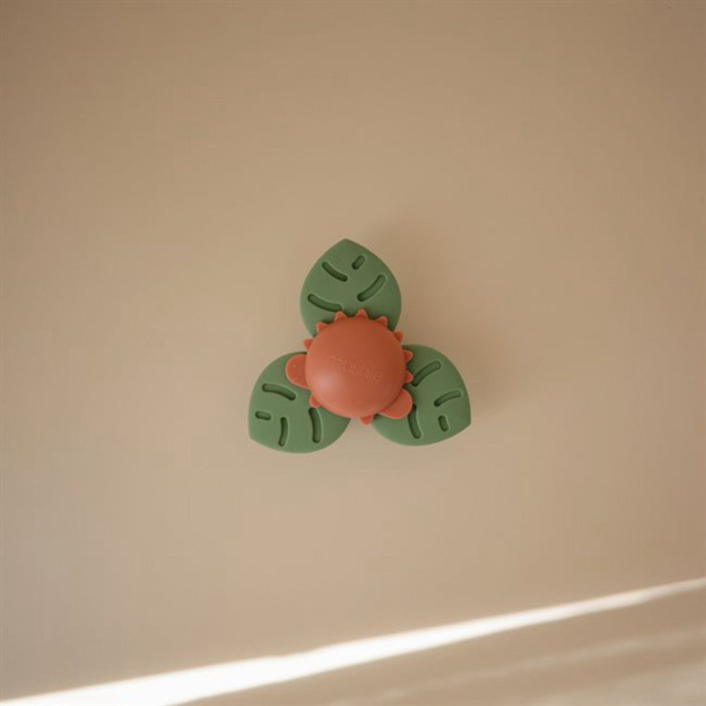 Køb Mushie Dino Suction Spinner Legetøj