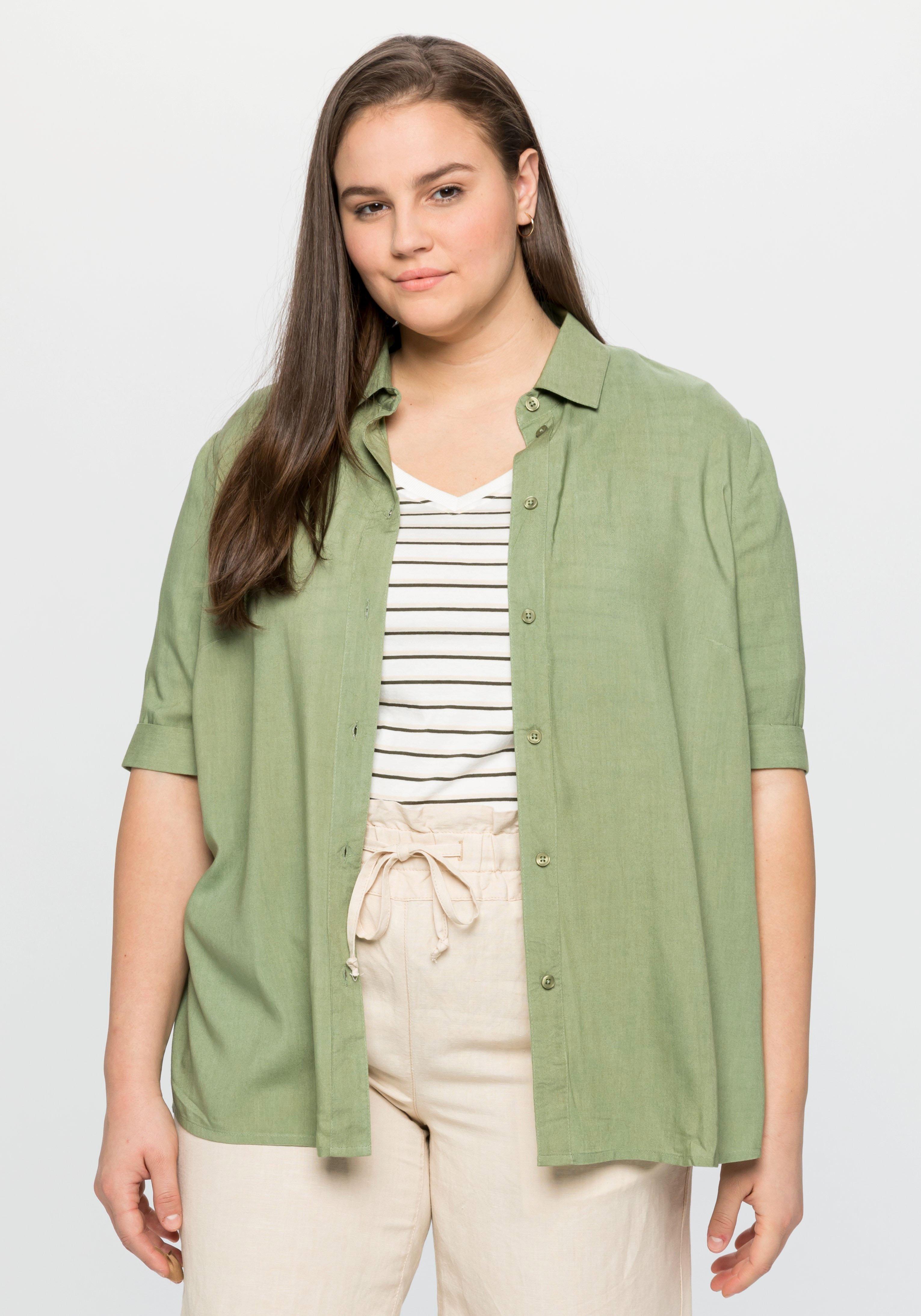 Bluse mit Hemdkragen und verlängertem Arm