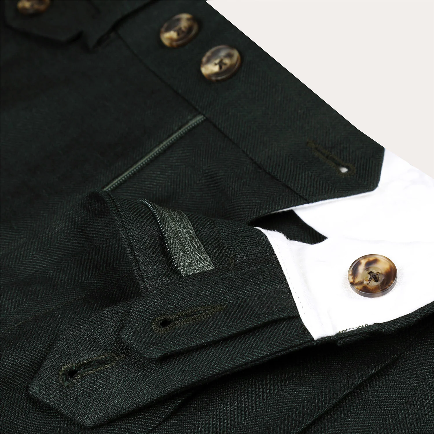 Double-pleated green linen pants