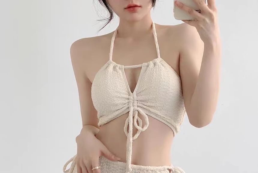 CUCURBIT - Set: Halter-hals effen trekkoordbikini + cover-up rok