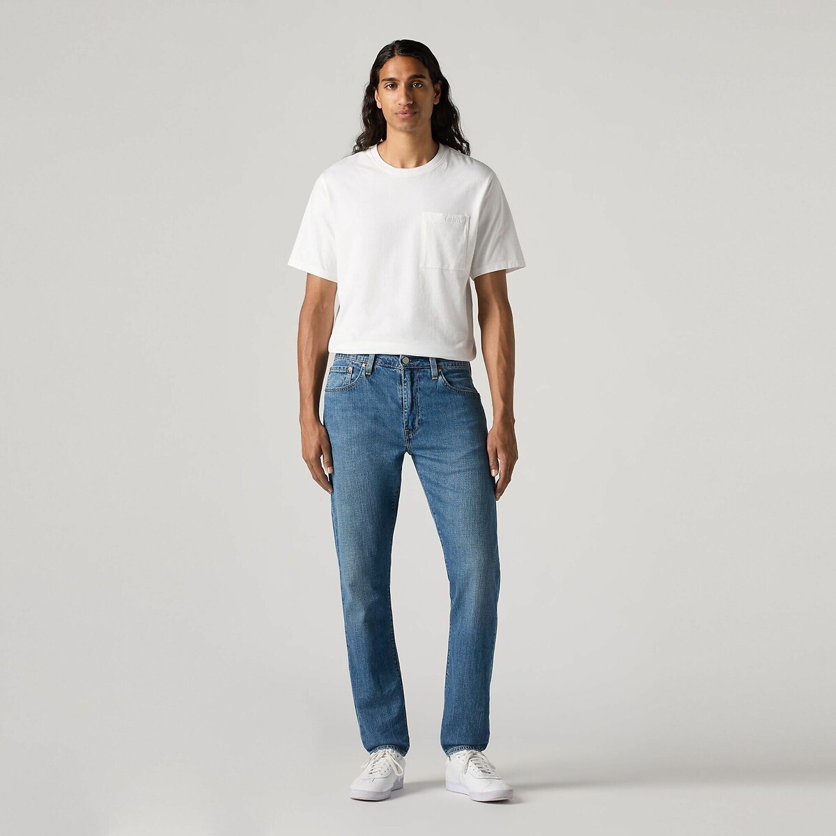 Calça jeans slim Taper 512® da Levi's em algodão e linho.