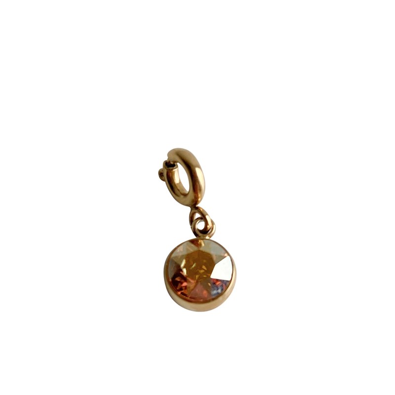 Charm pampille en acier doré avec cristal beige