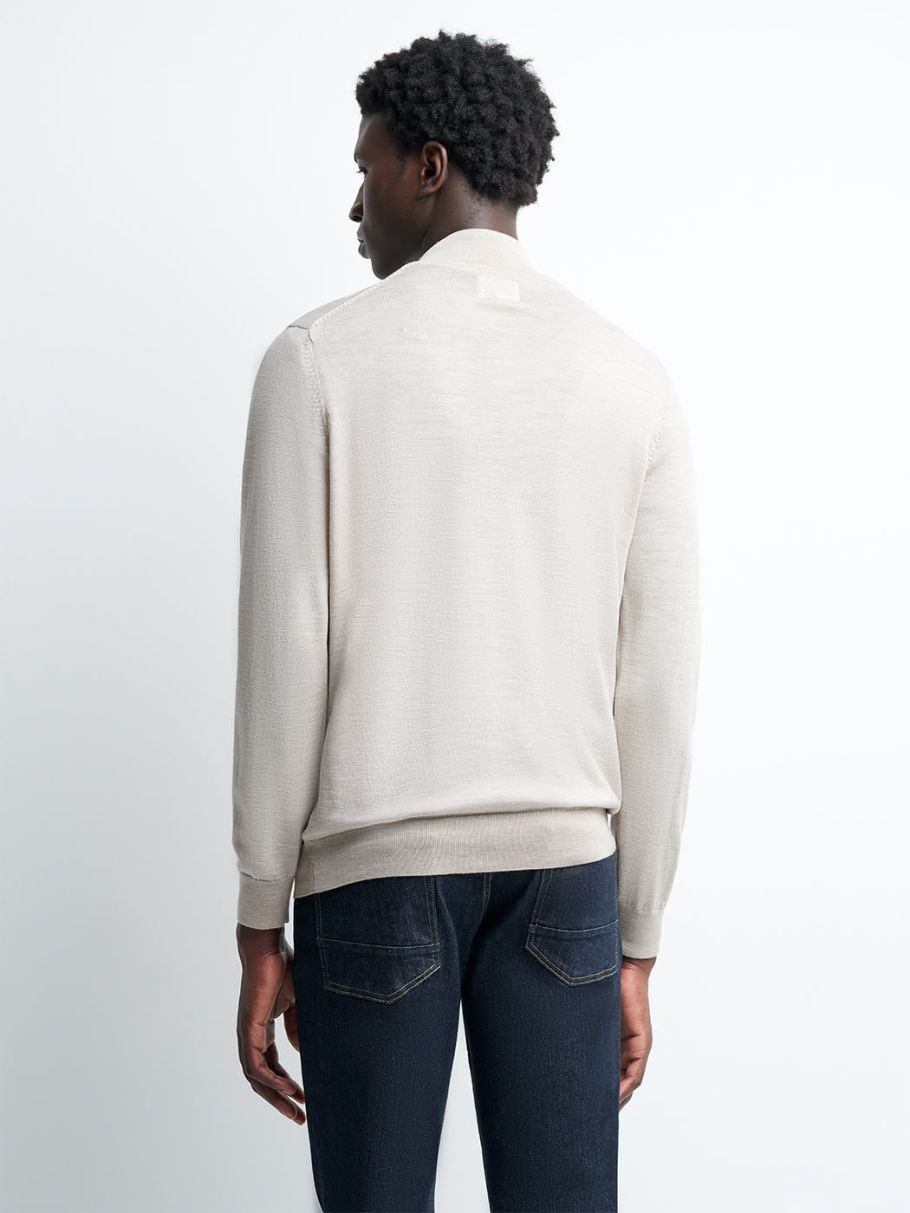 Pull col montant zippé en laine mérinos