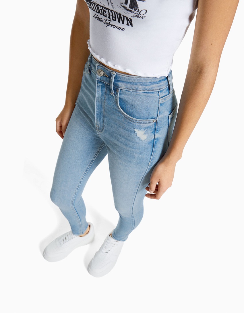 calça jeans skinny de cintura super alta