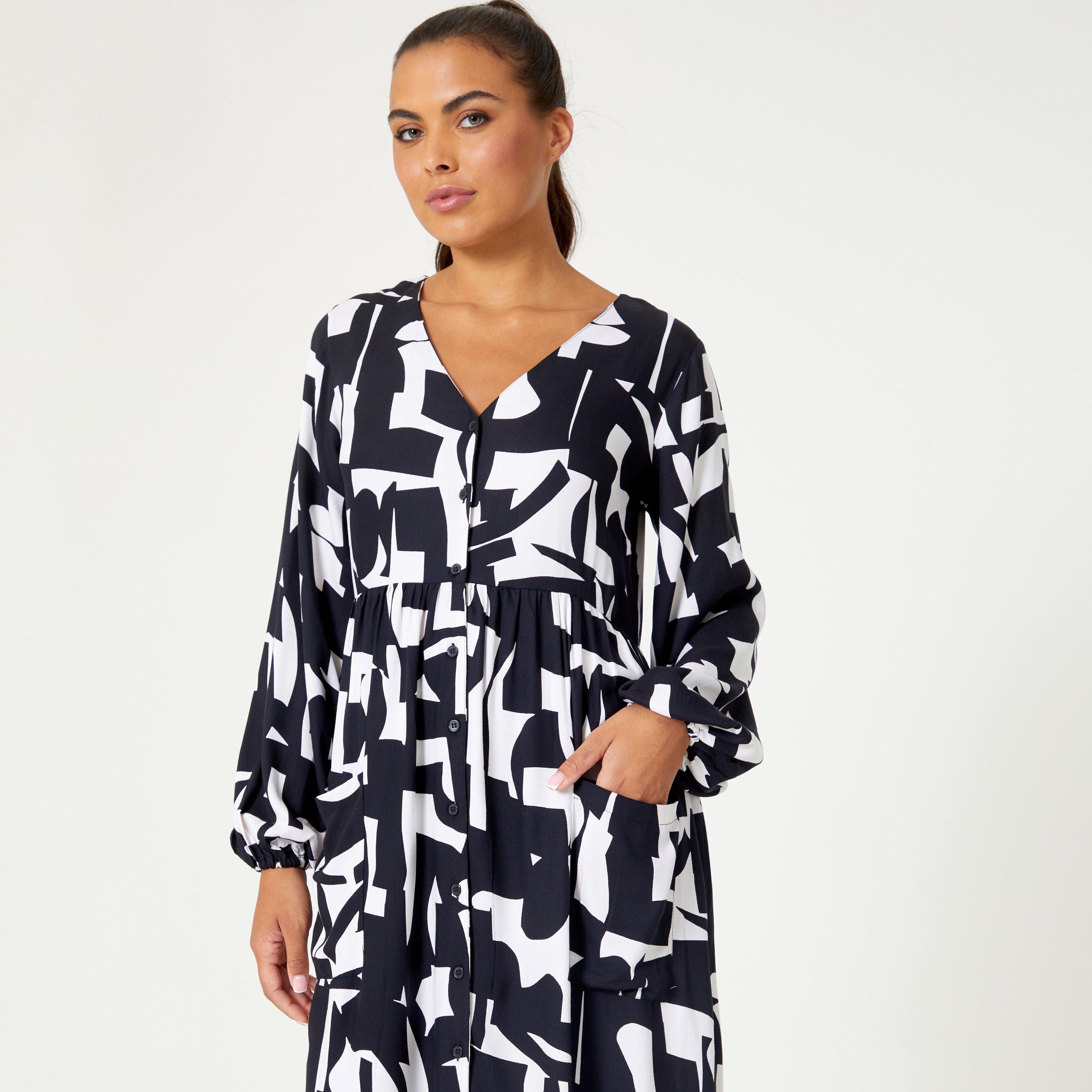 Be You Ladies Mono V Neck Pocket Midi Dress