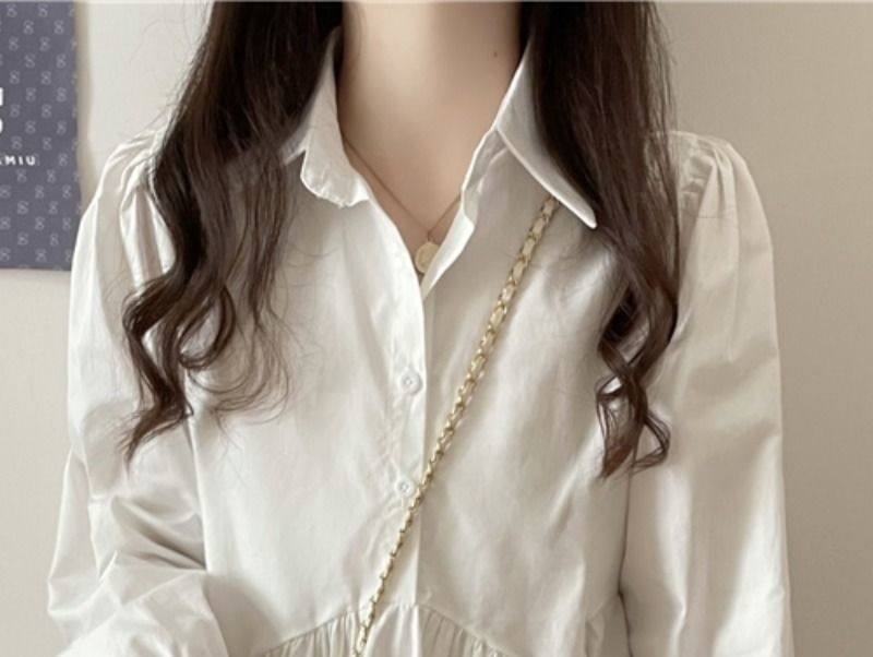 Sisyphi - Blouse met pofmouwen en knoopjes