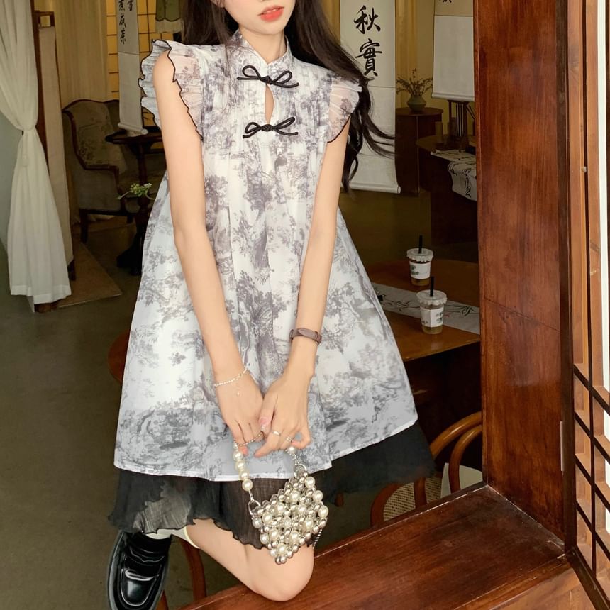 aistera - Mini A-lijn jurk met kapmouwen en doorschijnende print