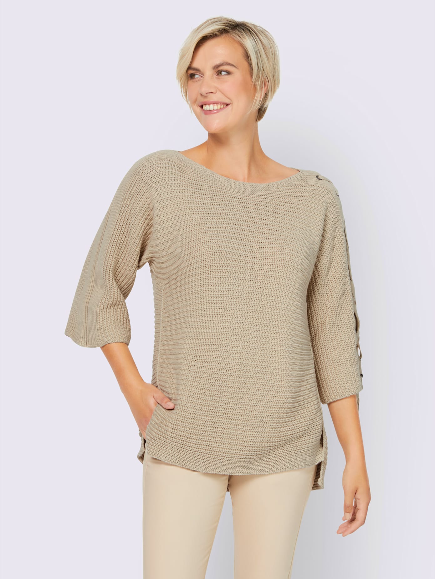 Pull laçage mode aux manches