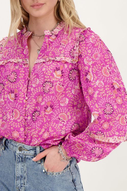 Roze blouse met ruffles en bloemenprint