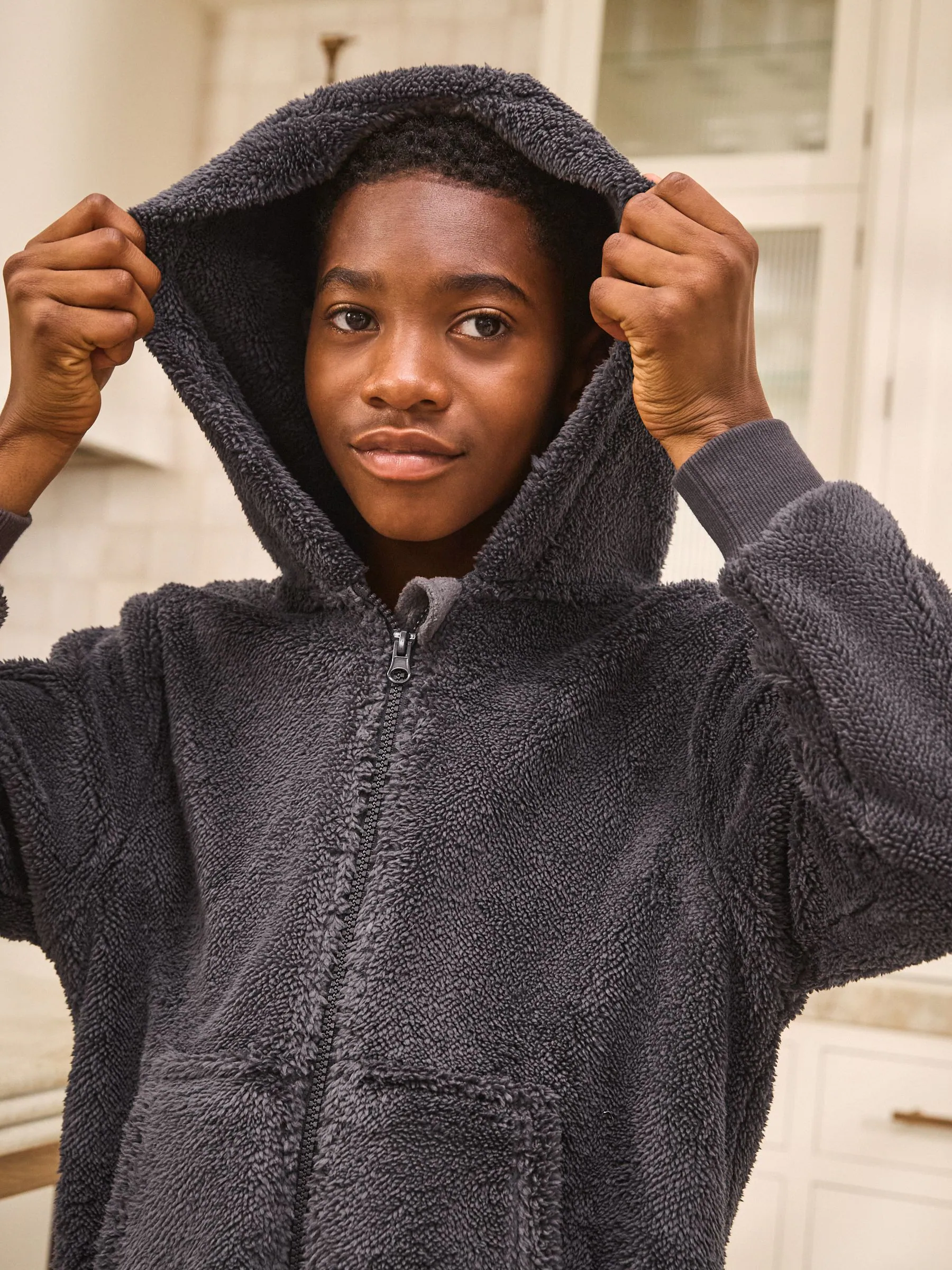 Grijs - Fleece onesie (3-16 jr)