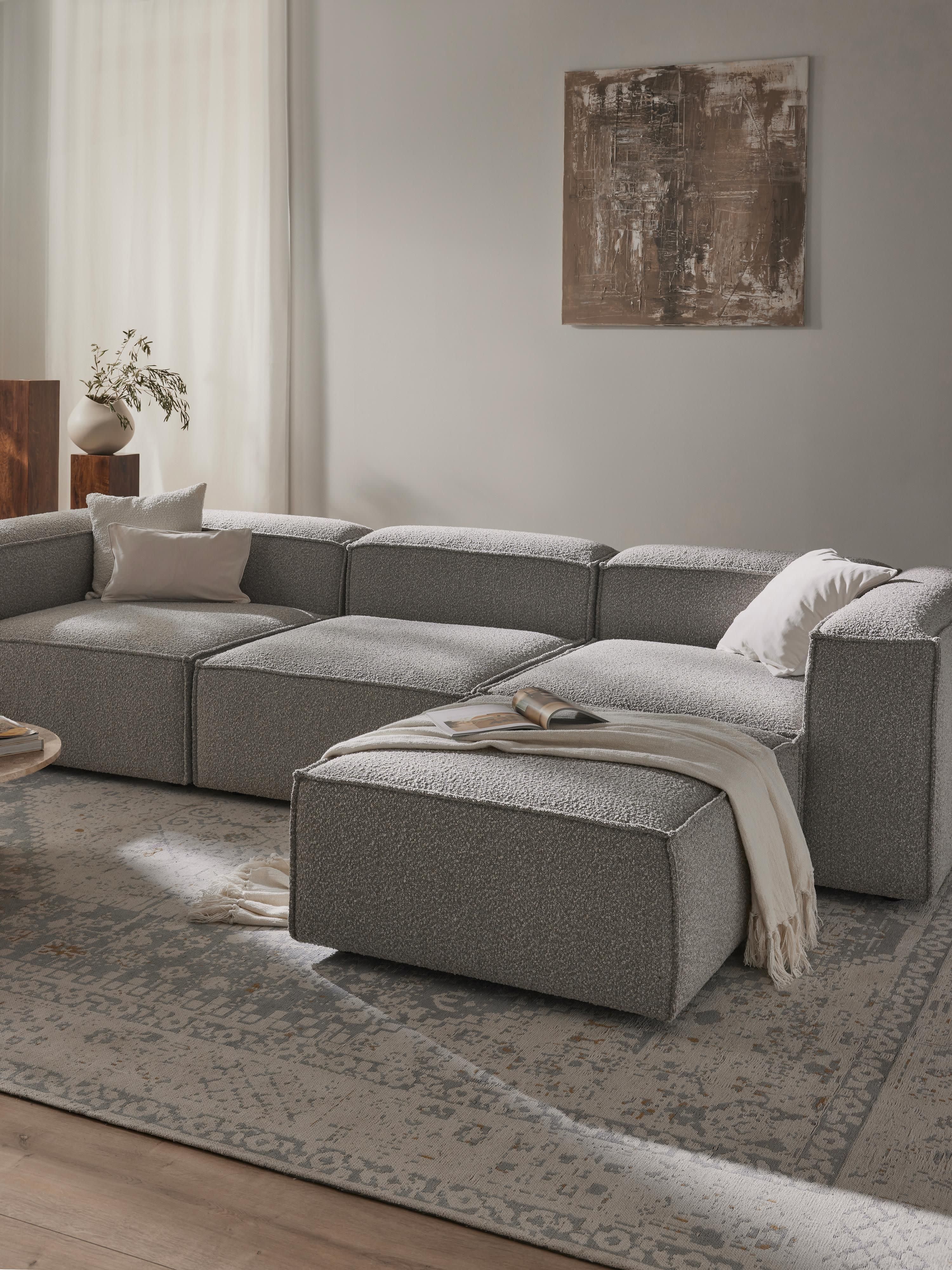 Lennon 4-zits modulaire bank in bouclé met poef (links/rechts)